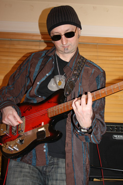 The $100 Guitar, Bruce Eisenbeil
