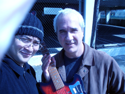 The $100 Guitar, Phil Burk Karl Evangelista